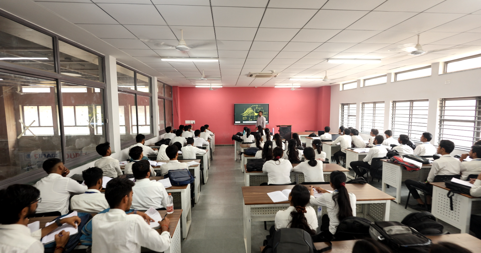 B.Com Professional students attending classroom lecture in commerce department